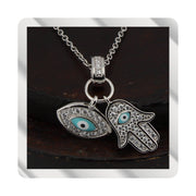 Collar con Colgante Mano de Fátima y Ojo Turco. Plata de Ley. Baño Rodio. Zirconitas. Cadena Forzatina CL1314799R - Henor